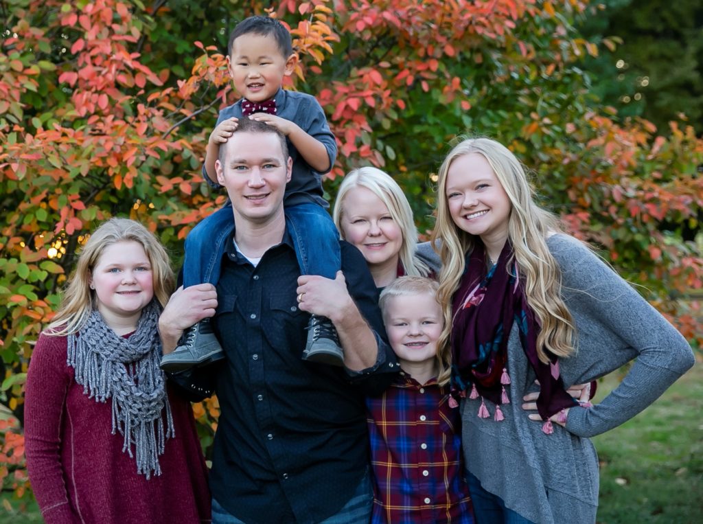 doctor and family smilling