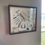 Art with real dental tools hung up in canvas style